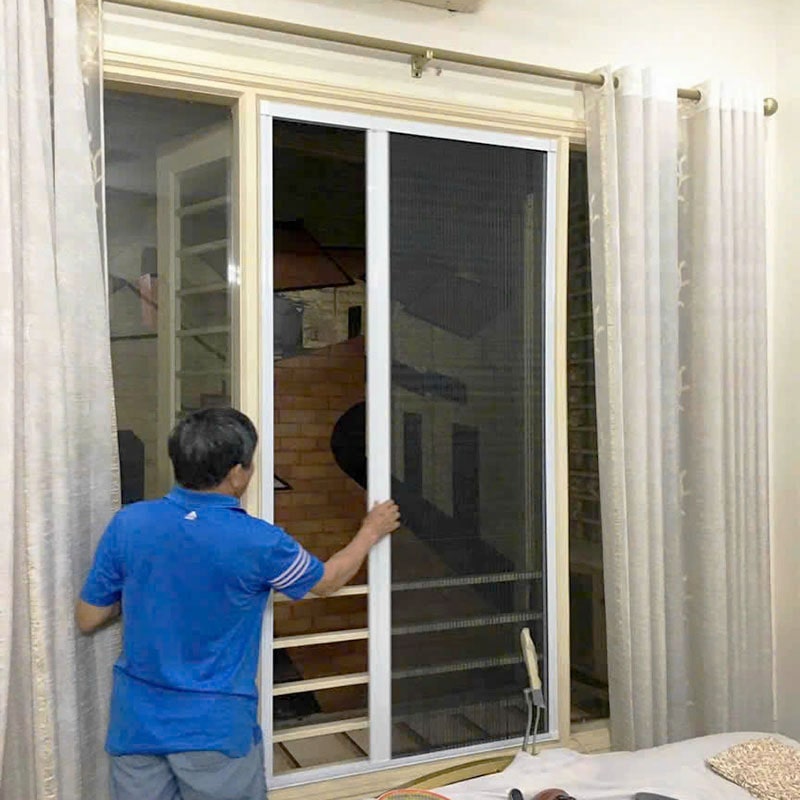 ảnh hoàn thiện cửa chống muỗi dạng xếp màu trắng quận cầu giấy 